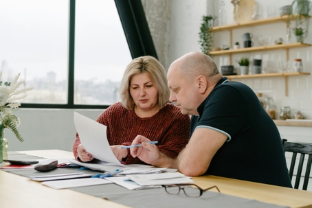 Couple reviewing documents together