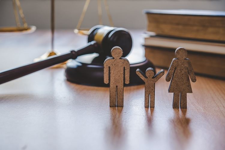wooden family and gavel